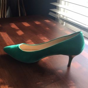 Green suede pumps